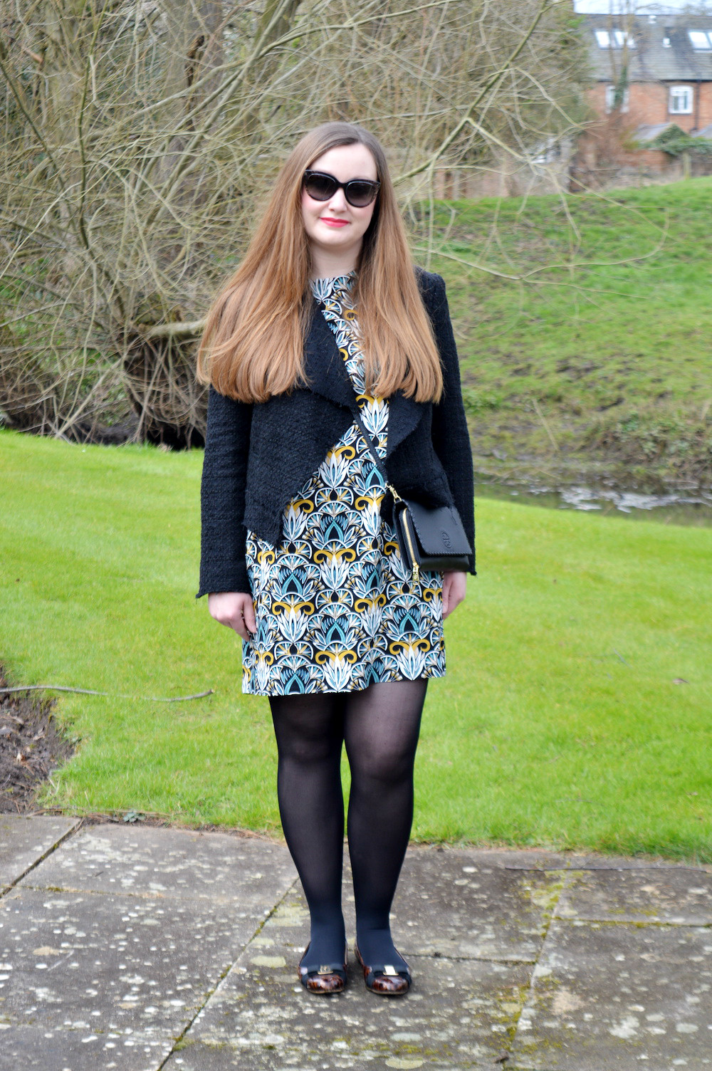 patterned dress and black tweed jacket outfit