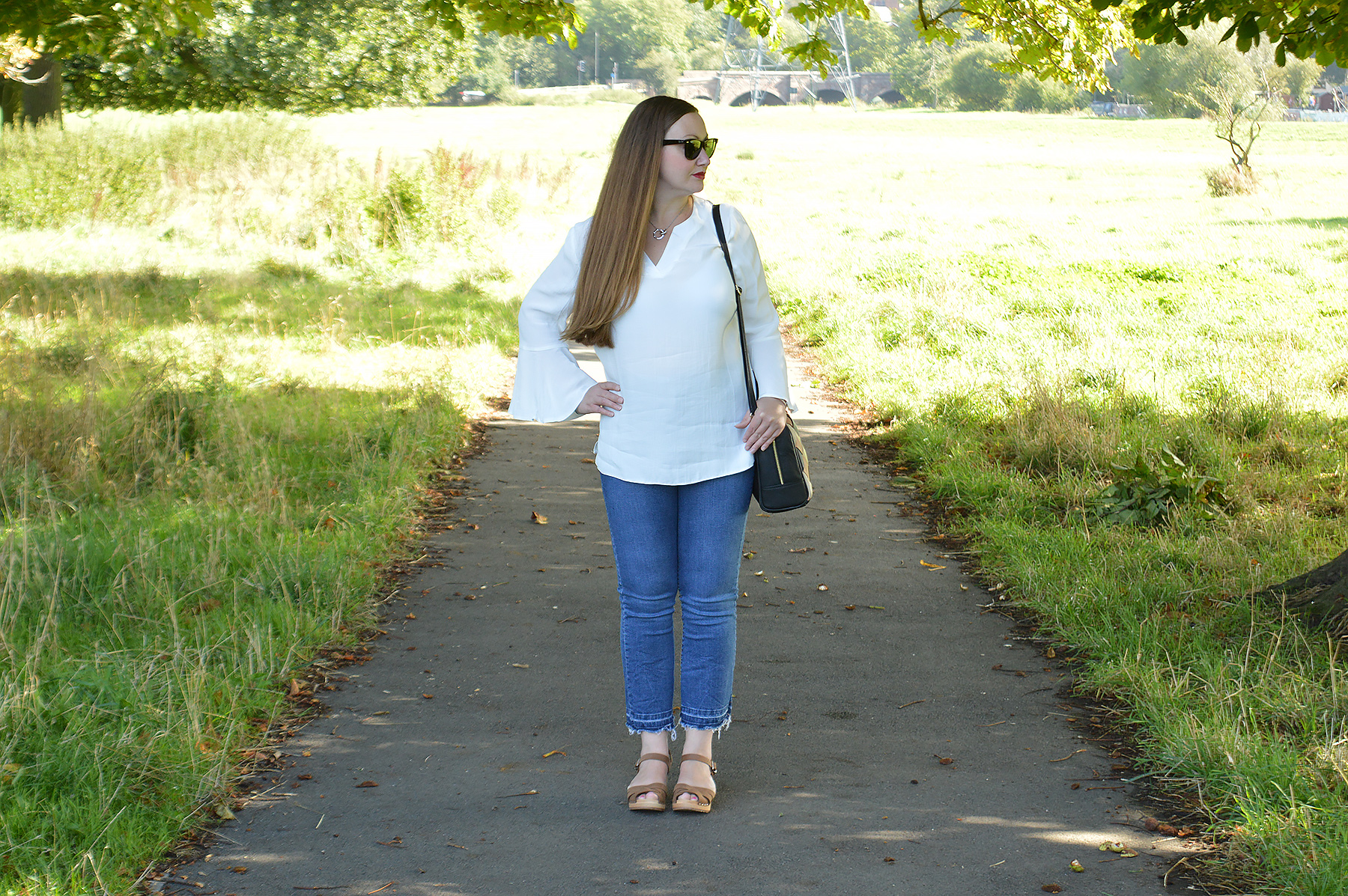 Cropped jeans and clogs