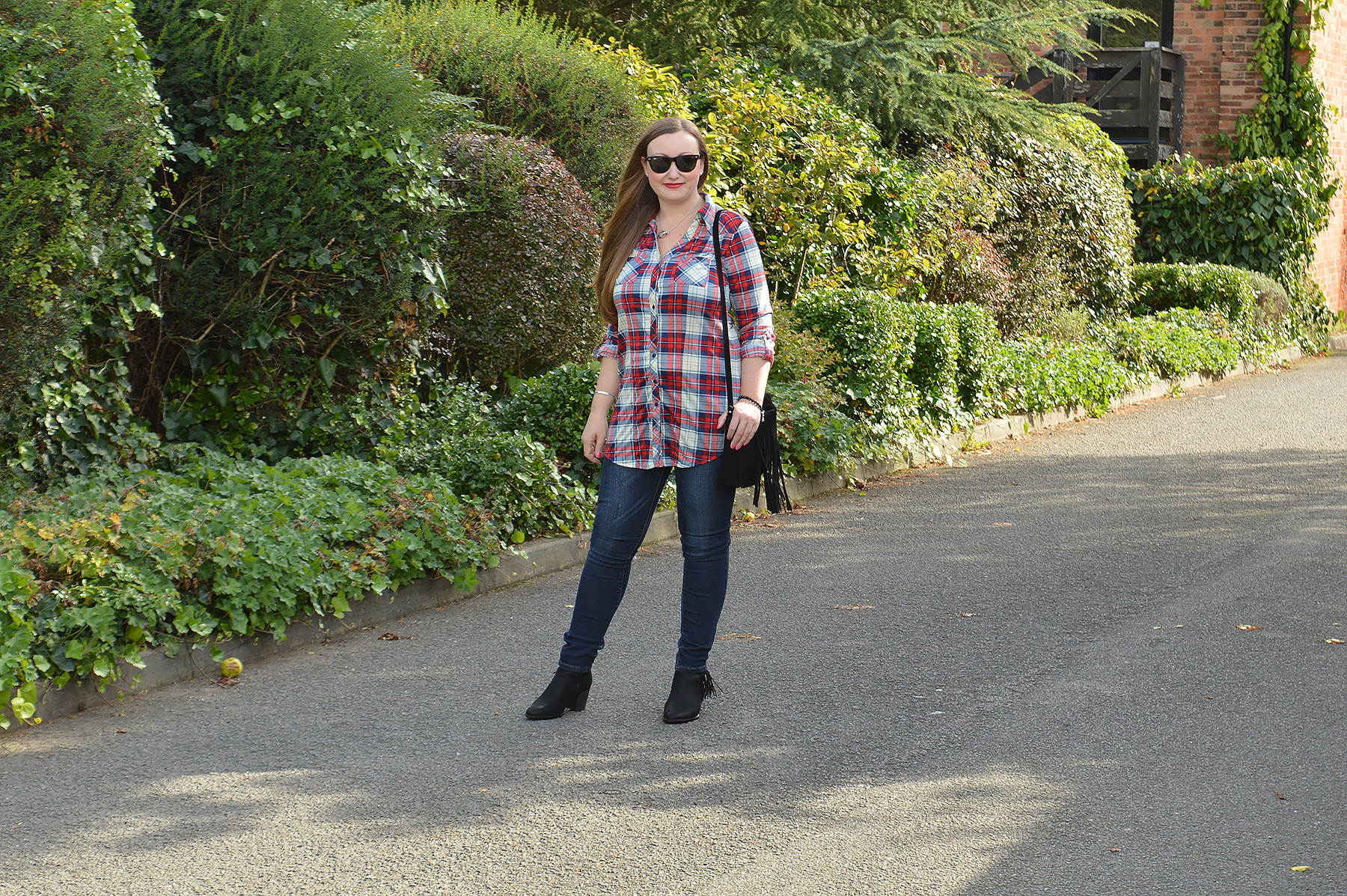 Plaid shirt with jeans and fringed boots