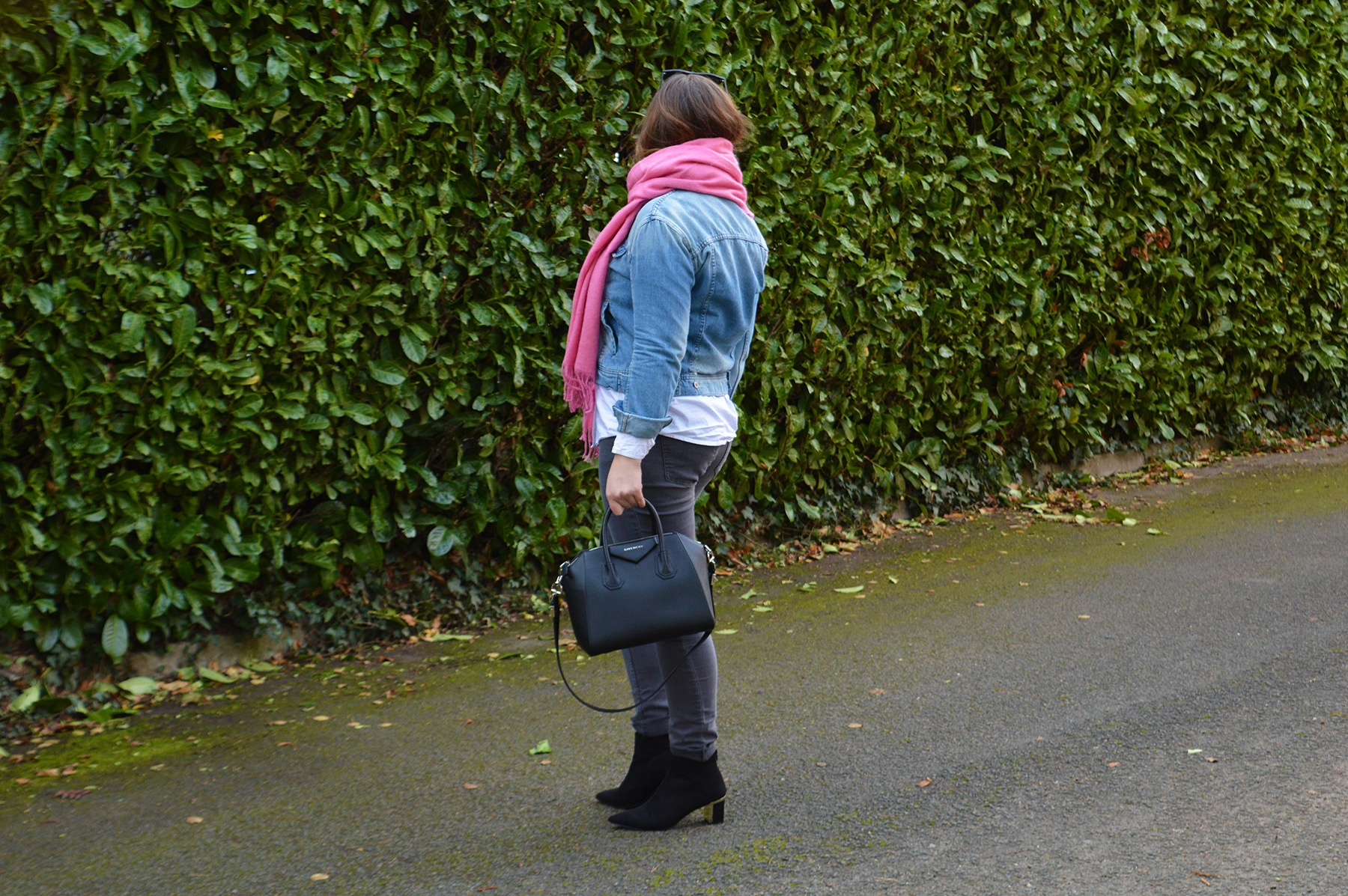 Accessorize with a pink scarf