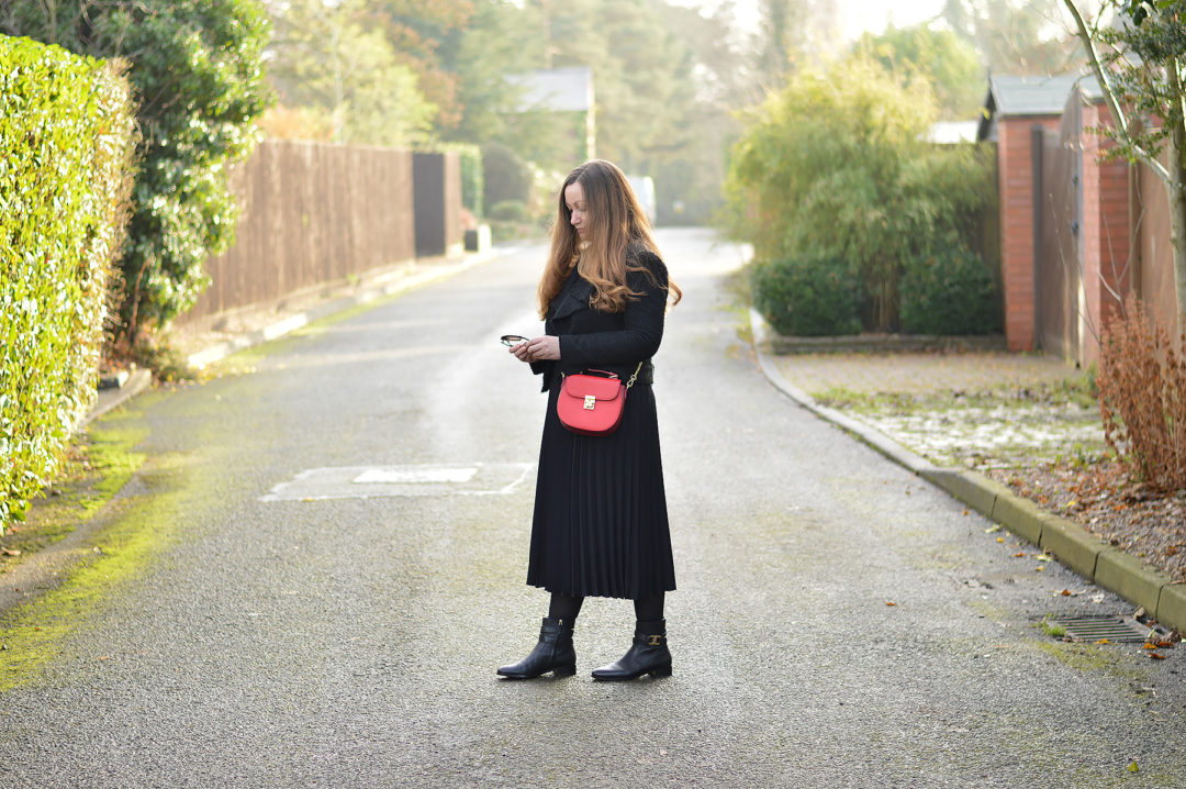 Black Outfit with red Folli Follie Bag