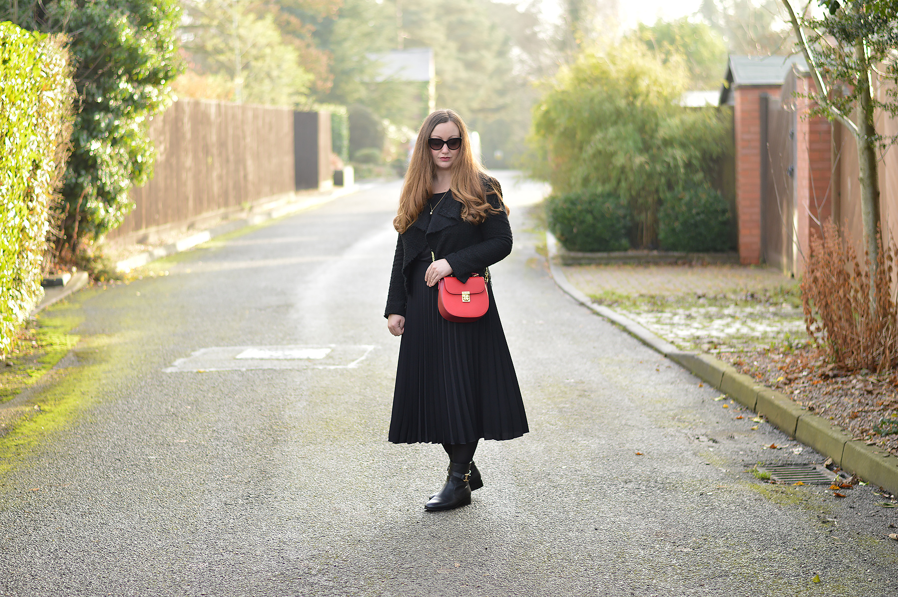 Tory Burch boots with red cross body bag