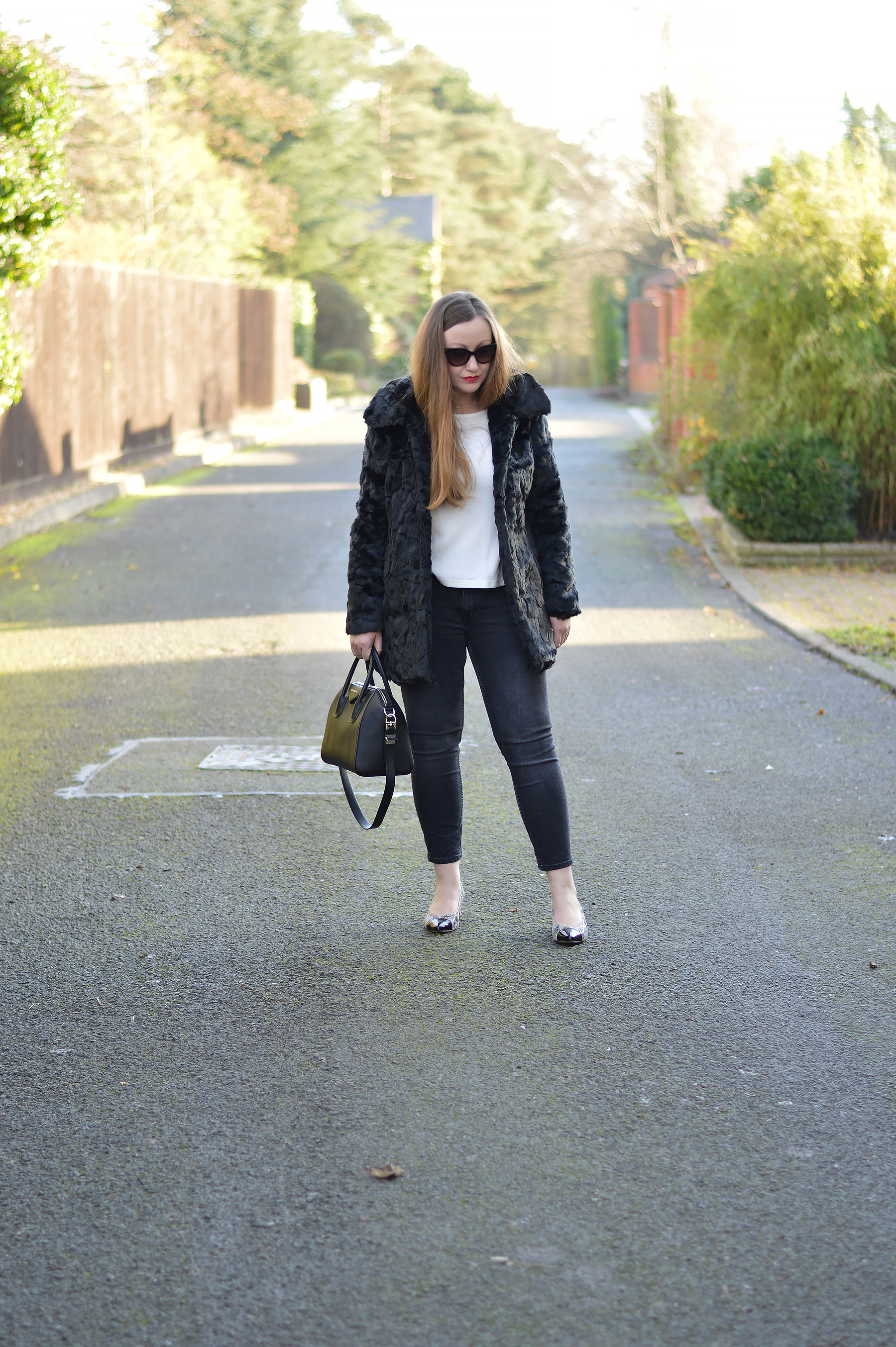 How to style a black fur coat