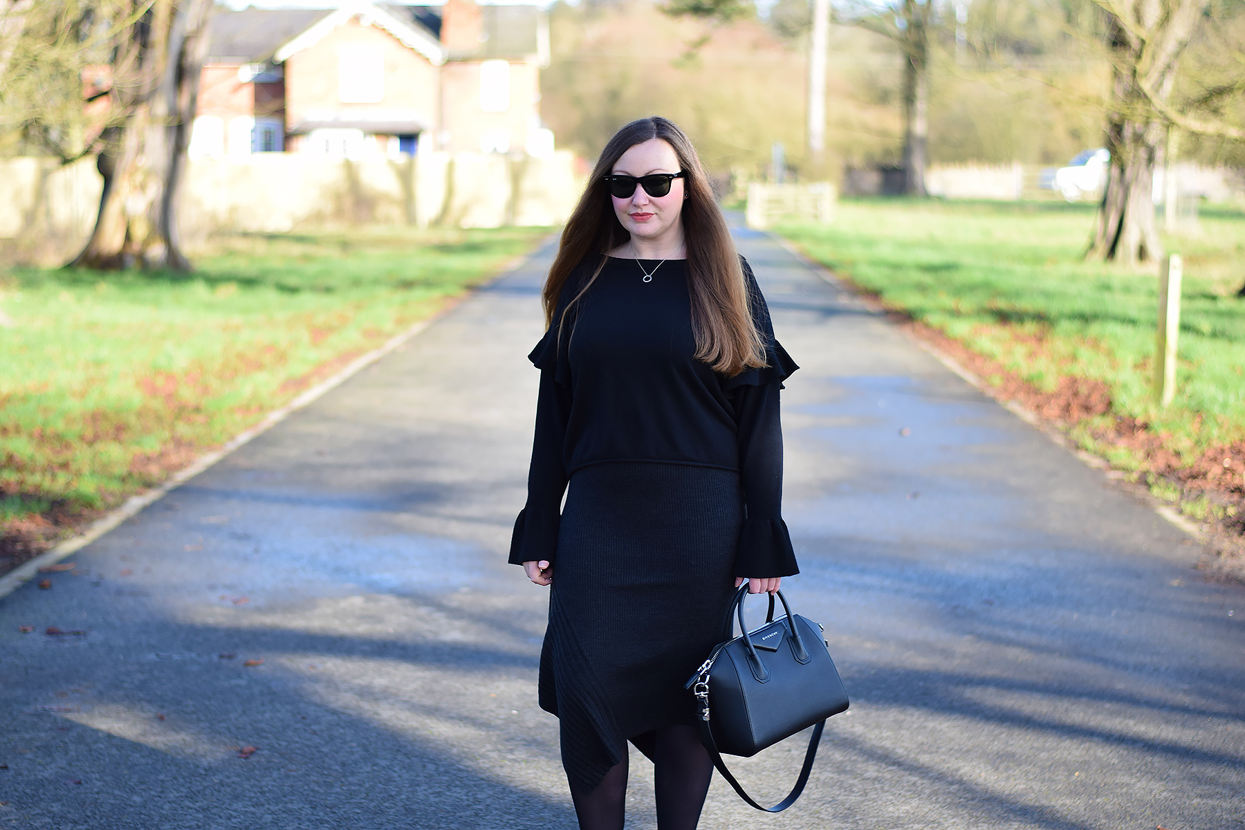 How to elevate your winter outfit with ruffles and asymmetric hemlines ...