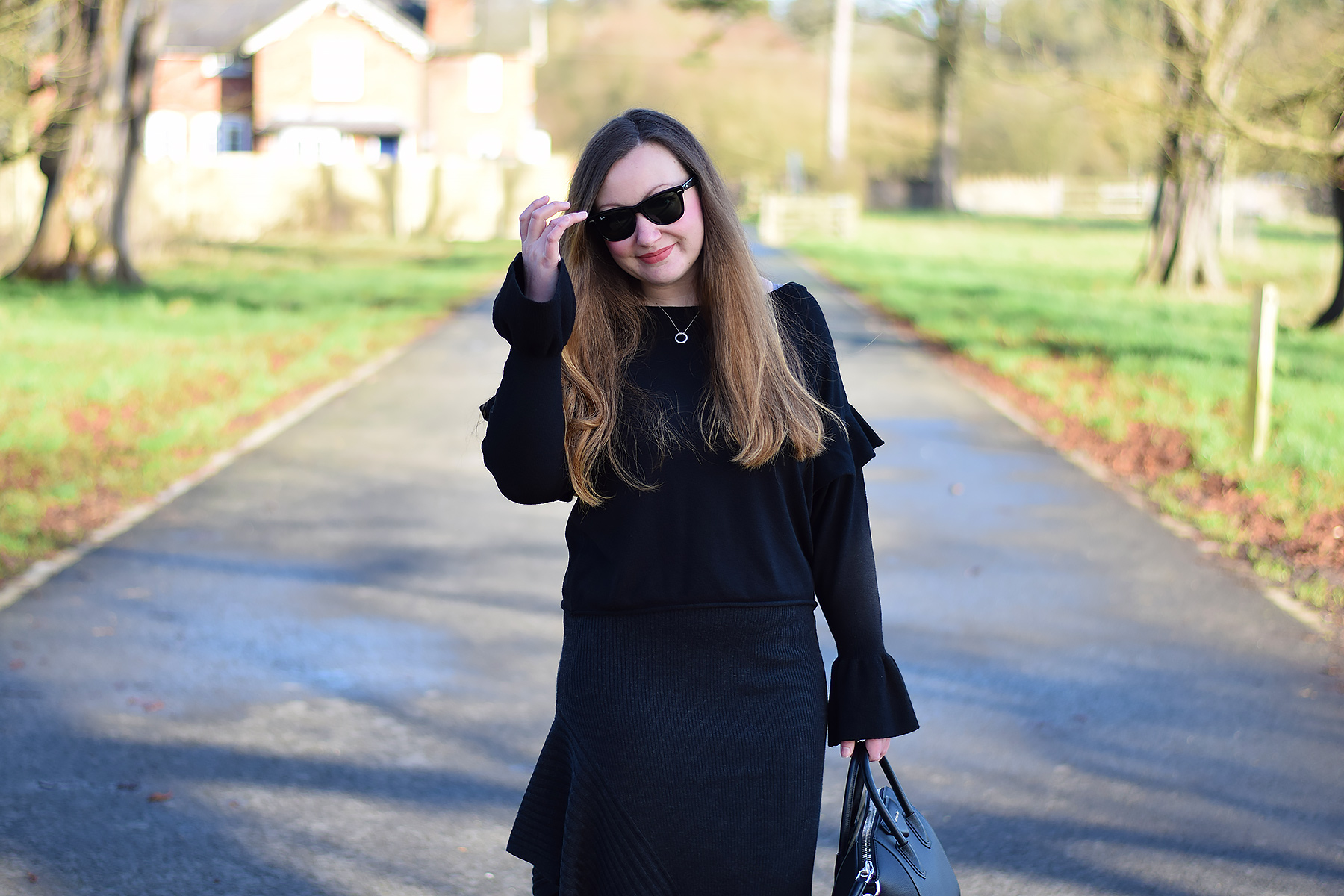 How to elevate your winter outfit with ruffles and asymmetric hemlines ...