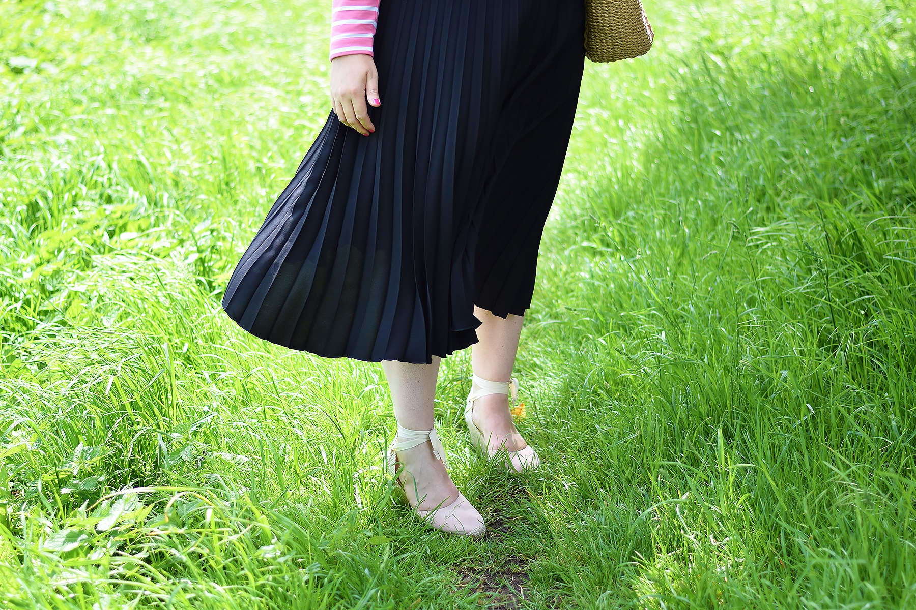 Black pleated midi skirt and espadrilles