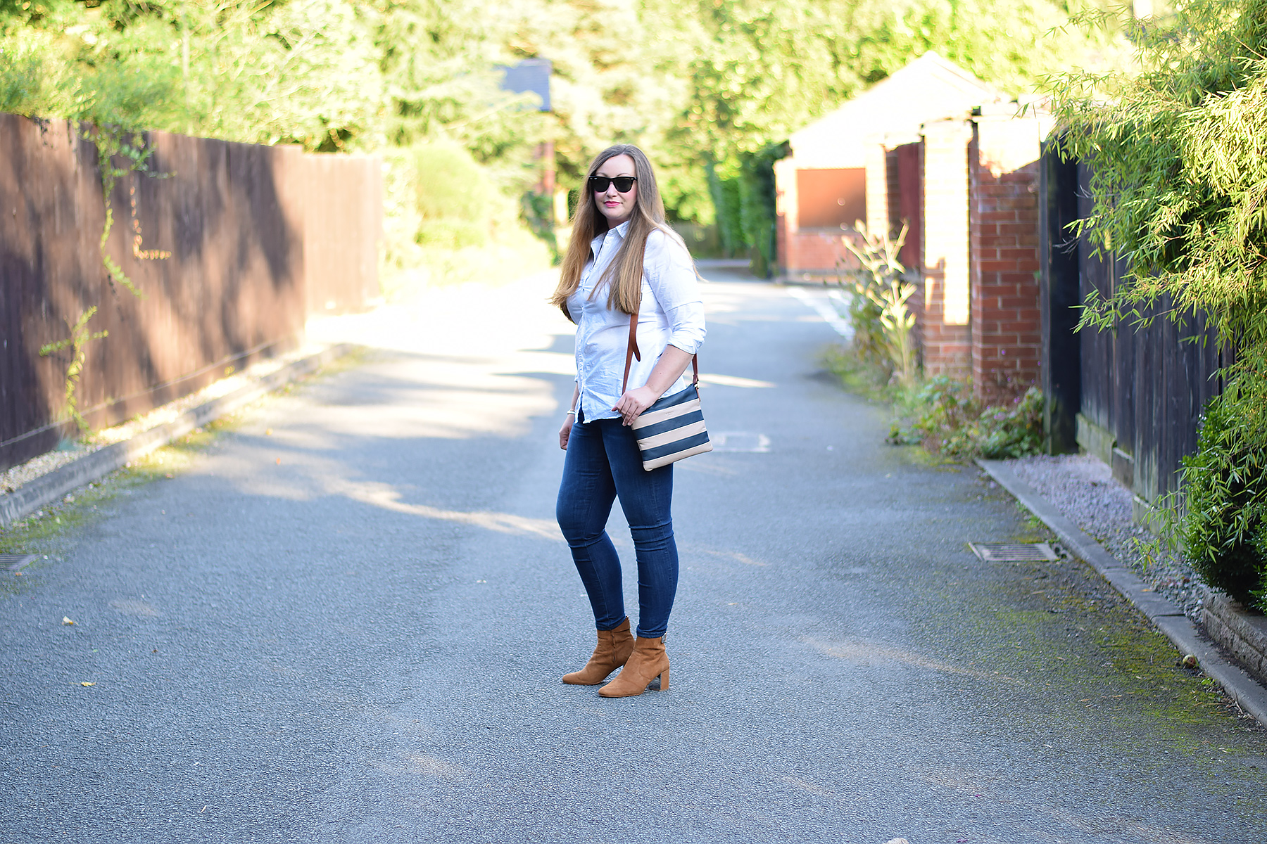 Gemma From Jacquard Flower UK Fashion blog wearing a classic style outfit and striped bag