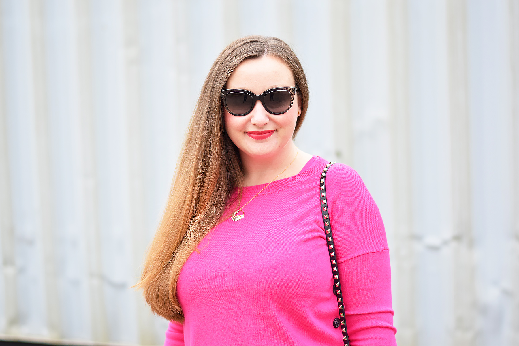 Bright pink jumper outfit ideas