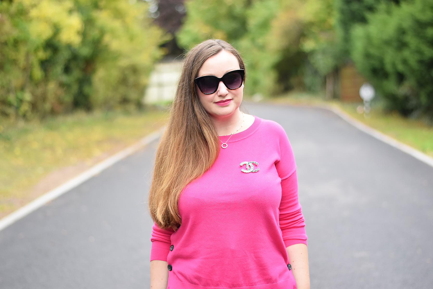 Boden Fuchsia pink jumper with button detail and a Chanel brooch