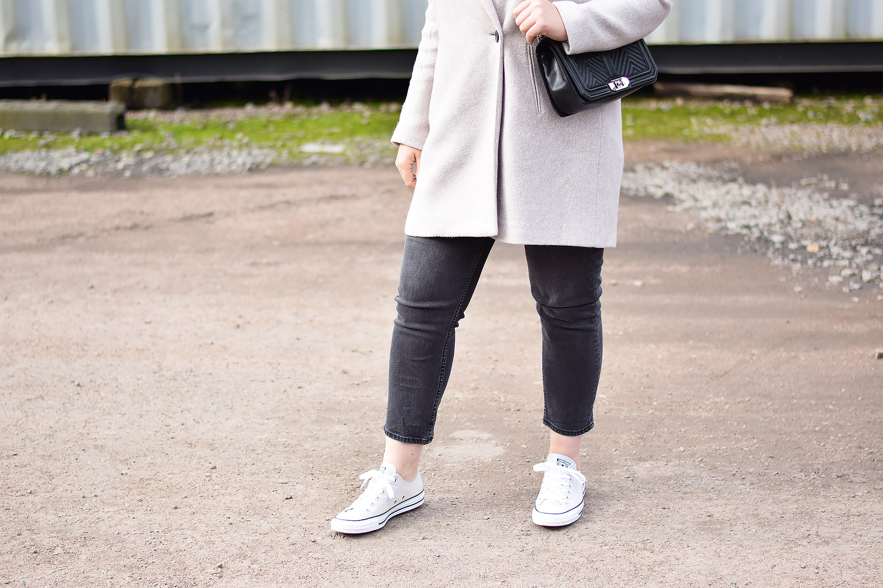 Grey coat and converse with black jeans and rebecca minkoff love bag