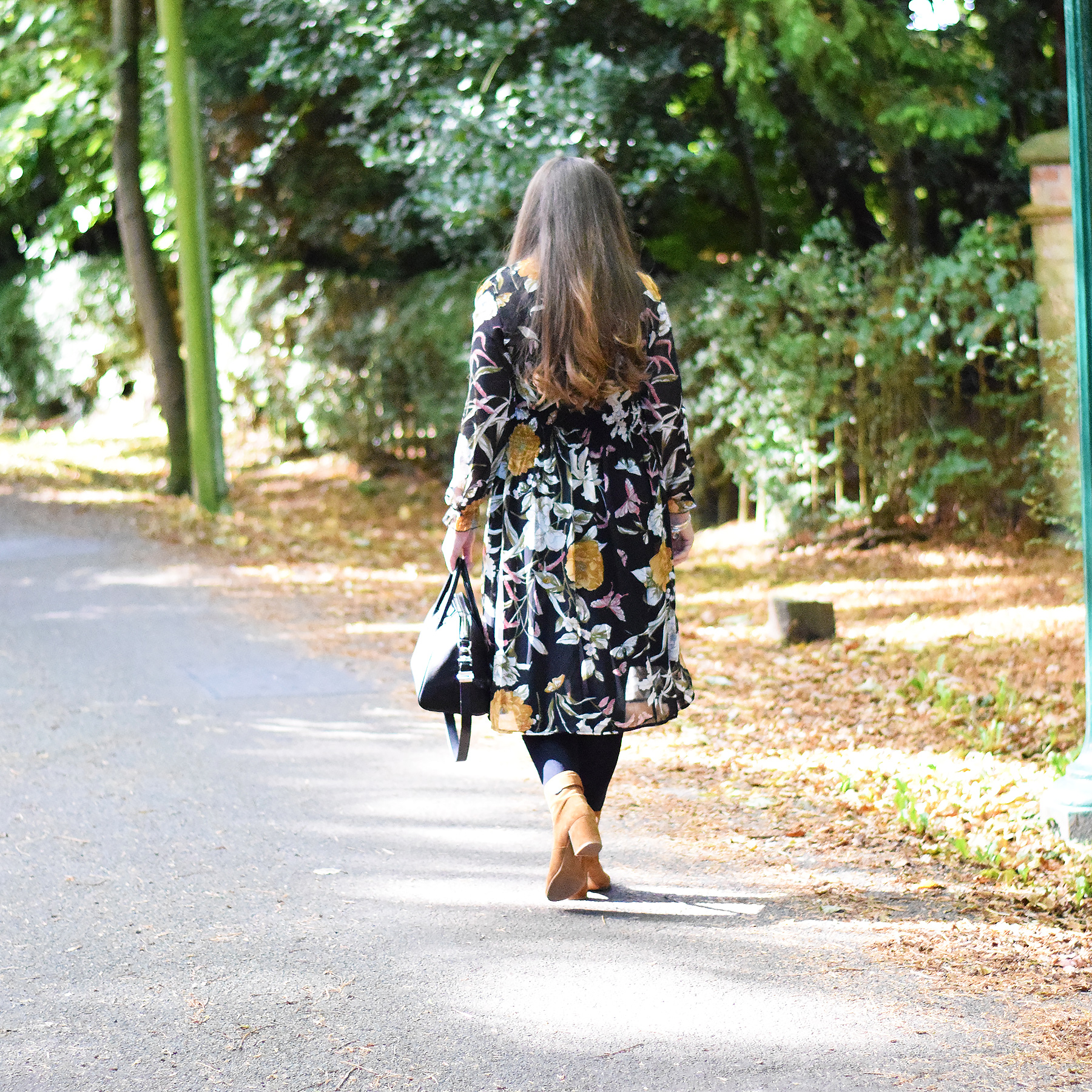 Moody Floral midi dress with tights and boots