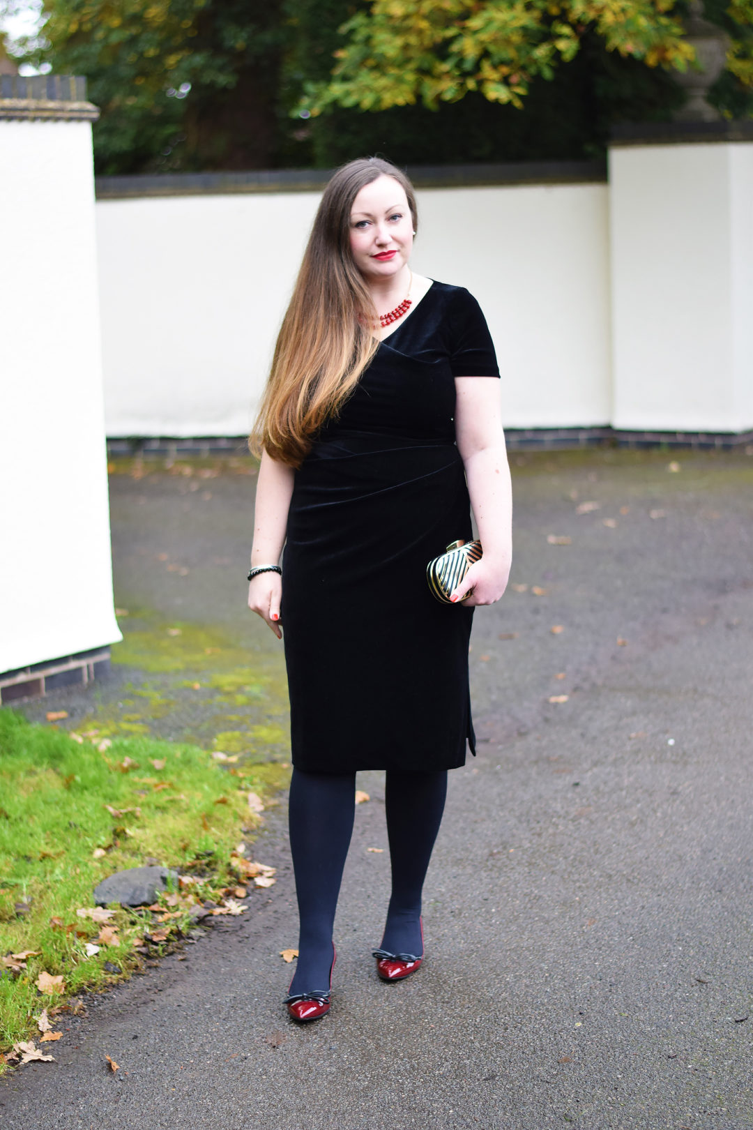 BLACK VELVET MIDI DRESS WITH POPS OF RED