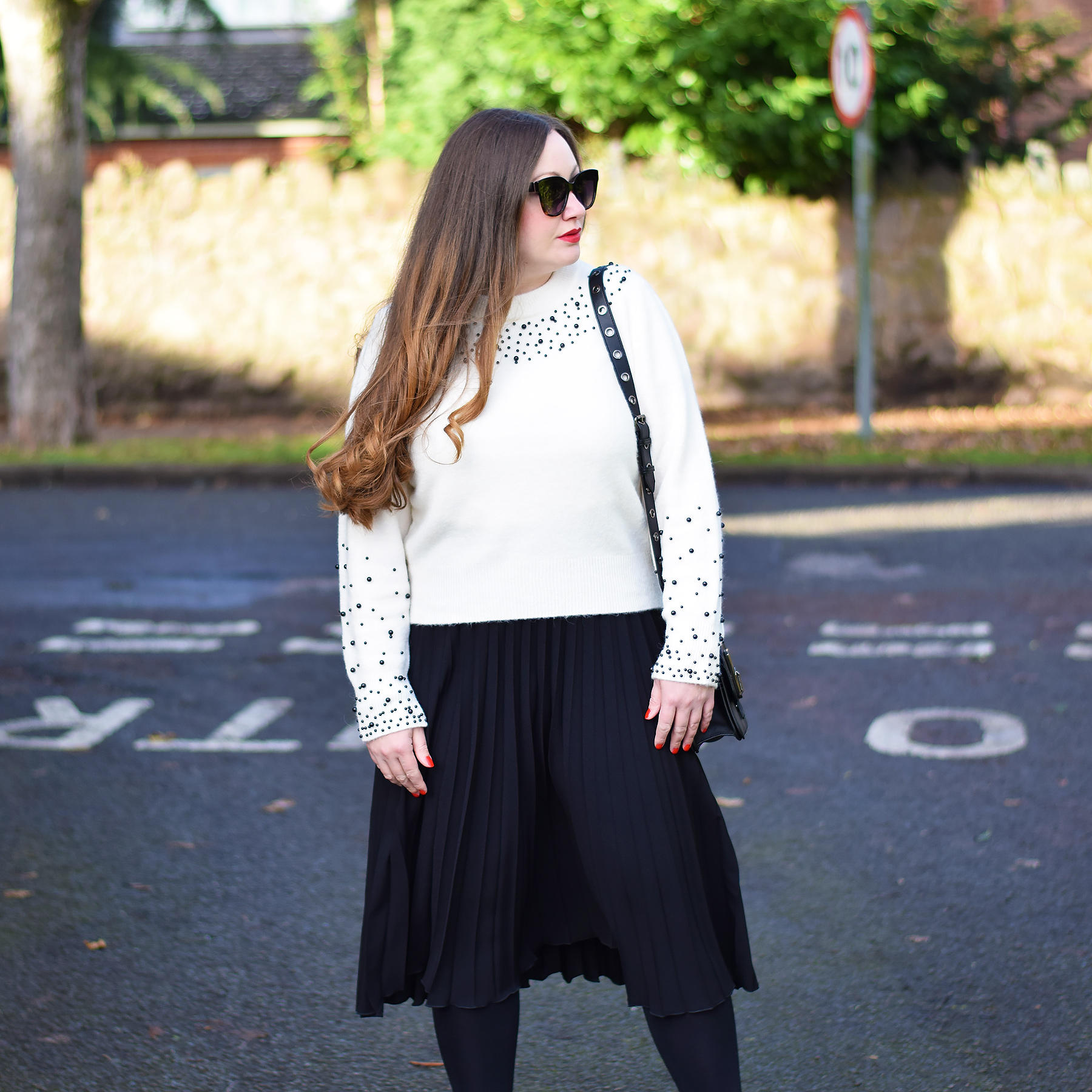 H&M Beaded Jumper with black pleated skirt