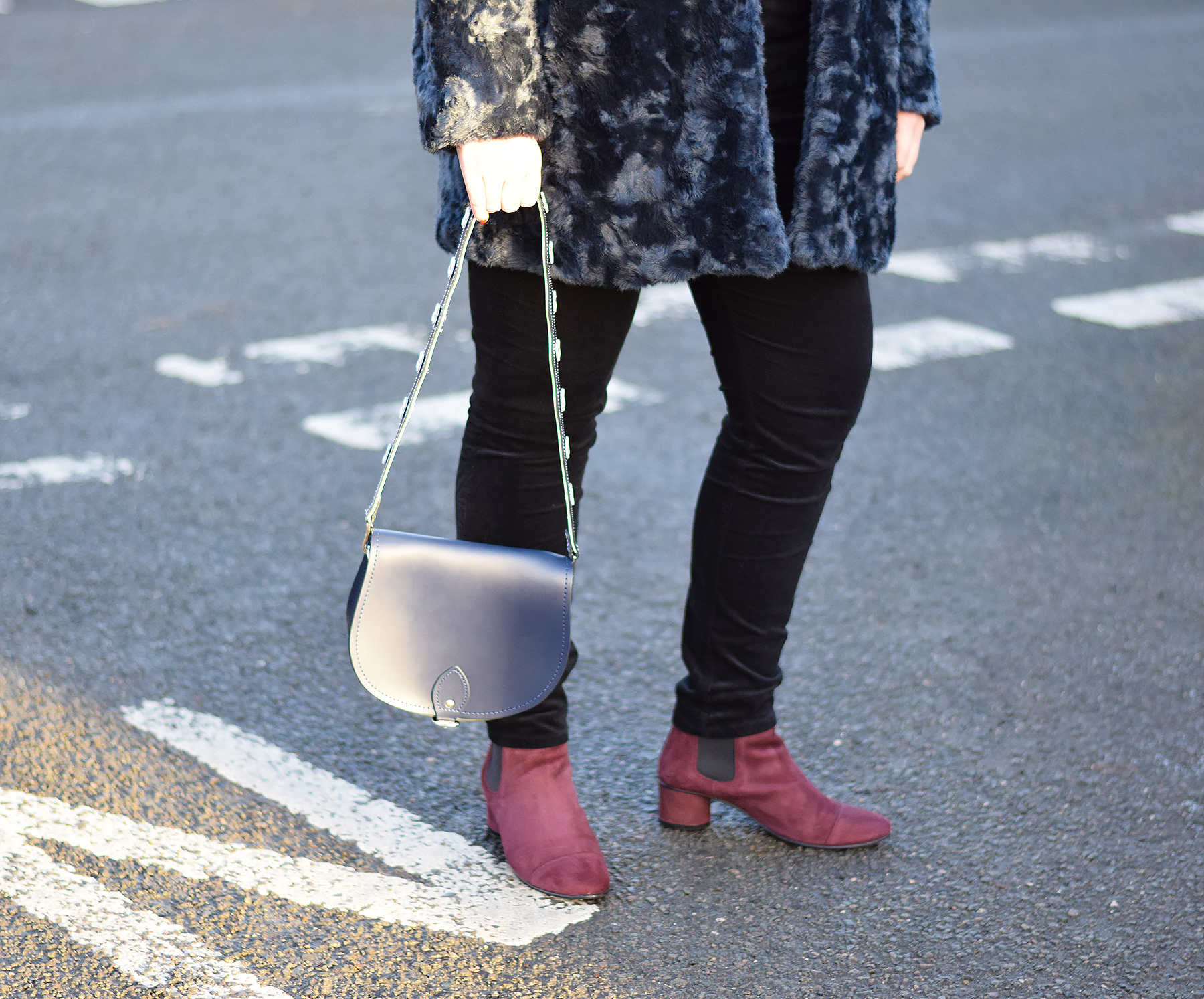 Gweniss Avery Saddle Bag with navy floral guitar strap and burgundy ankle boots