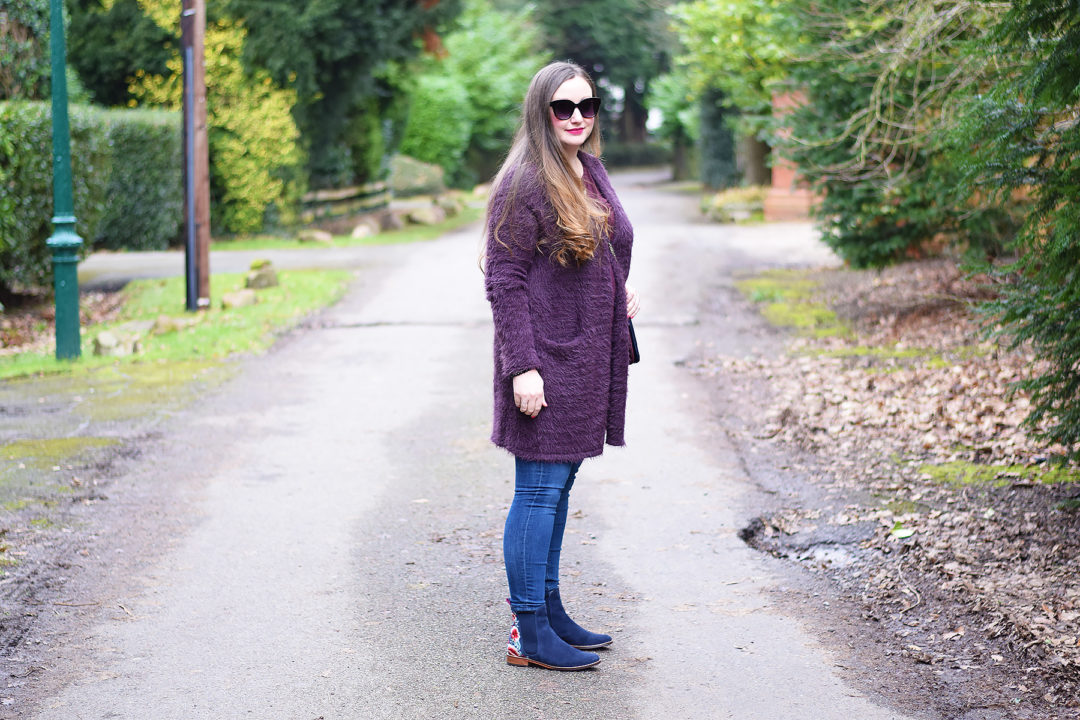 UK fashion blogger wearing fluffy cardigan and joules embroidered boots