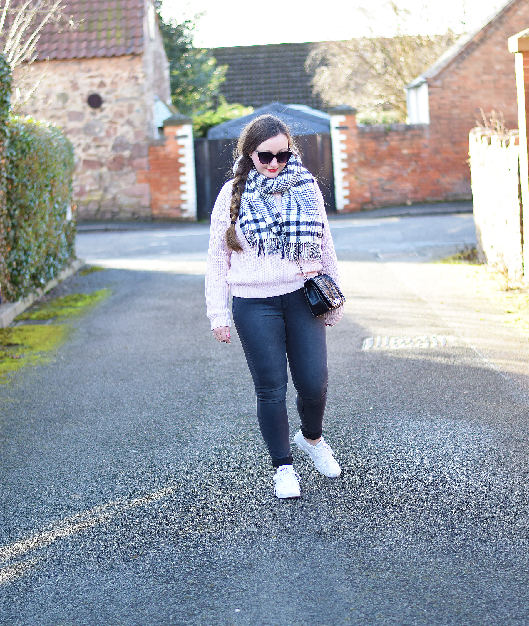 pink jumper oversized scarf and trainers outfit