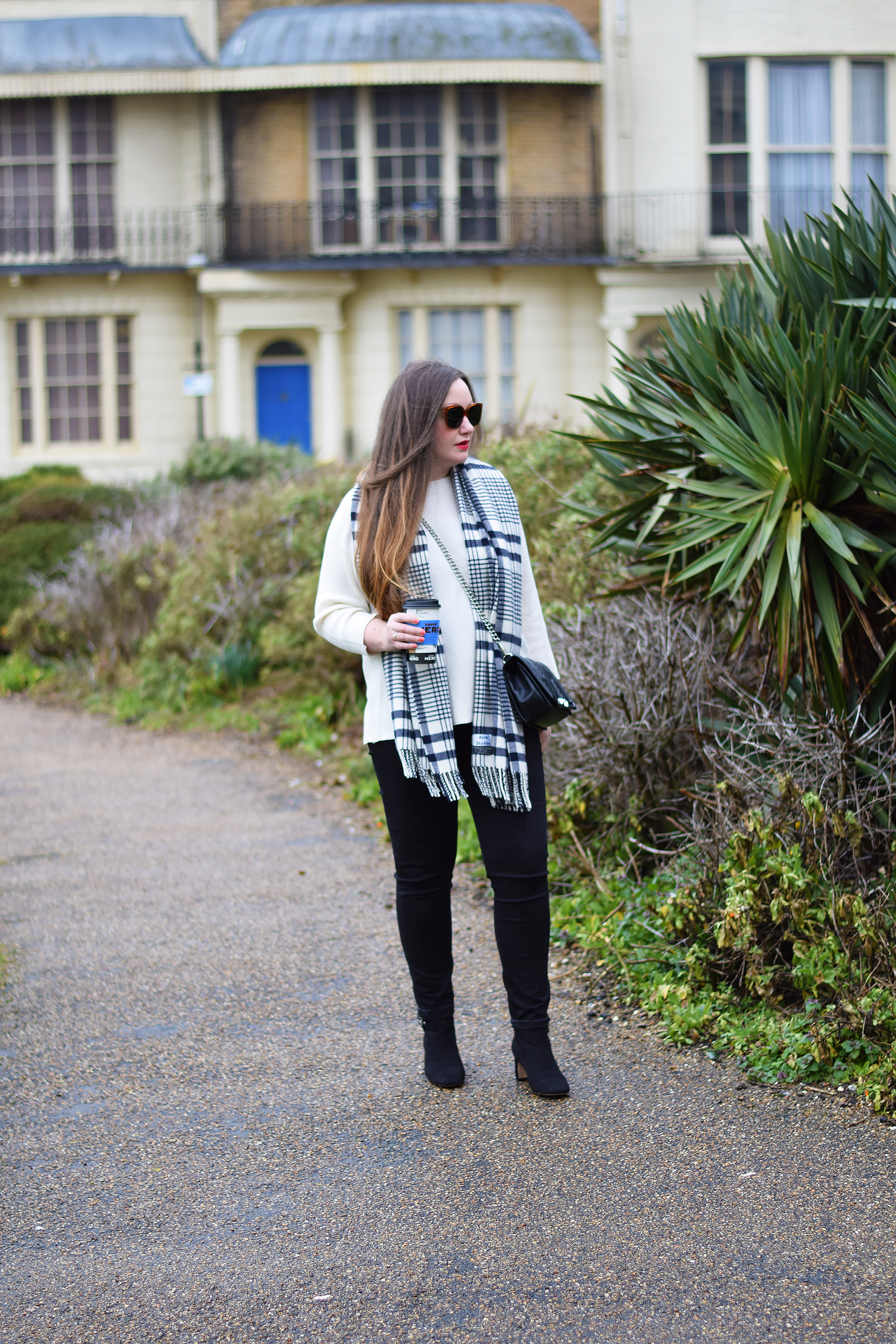 Layering a maxi scarf over a jumper outfit