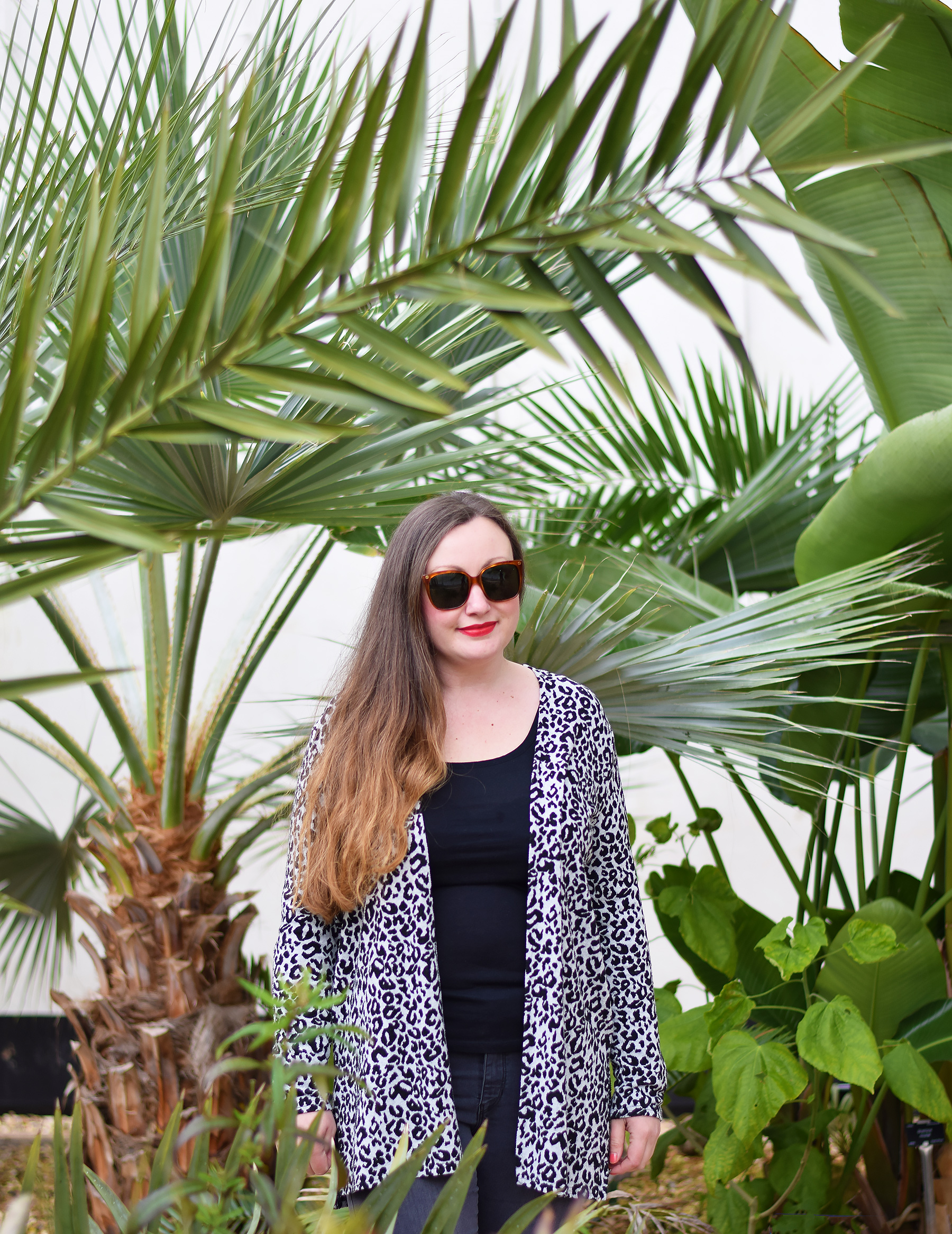 Gemma from Jacquard Flower Blog wearing leopard print in the Palm House botanical gardens