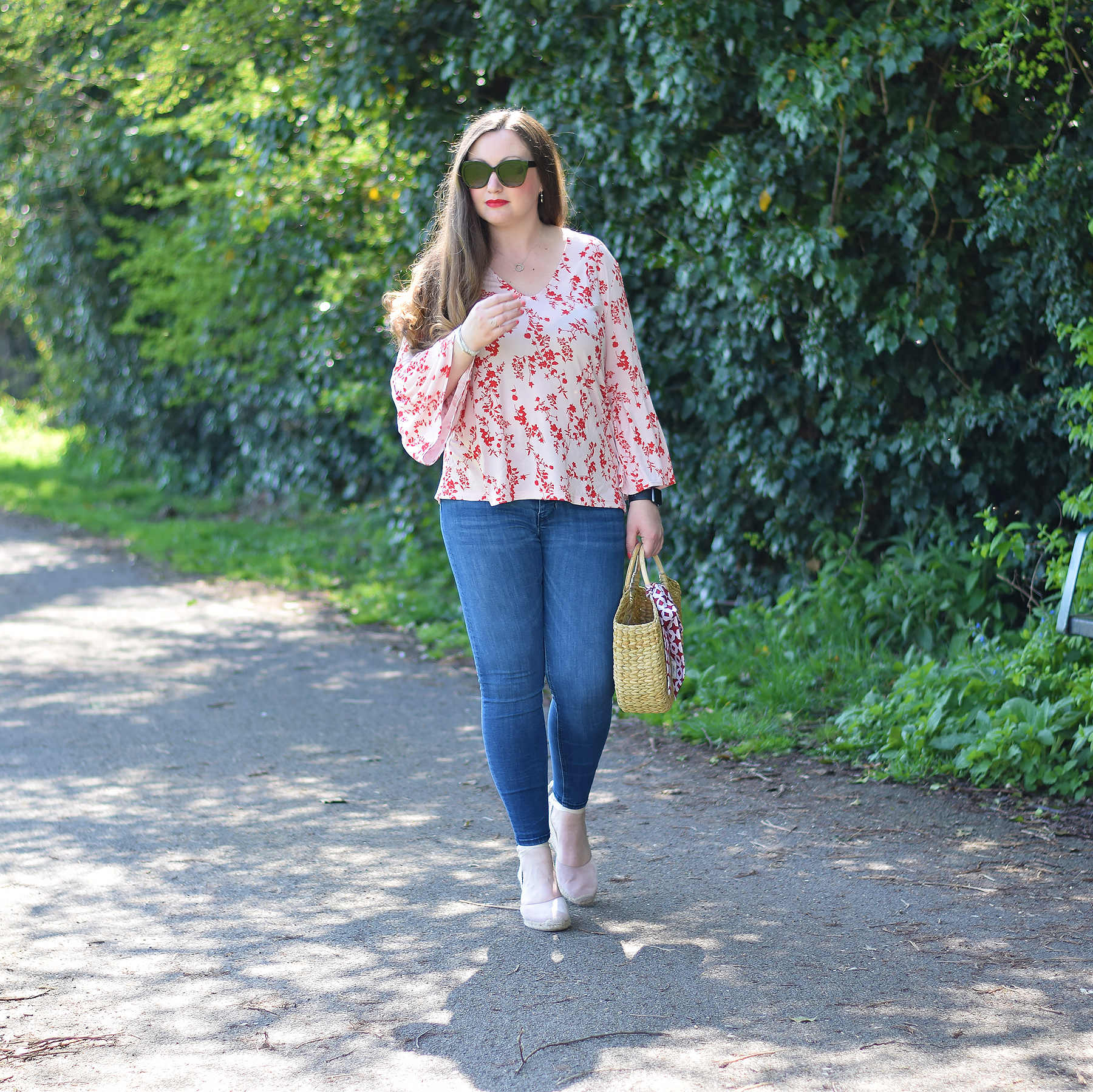Gemma From Jacquard Flower UK fashion blog wearing red and pink floral outfit