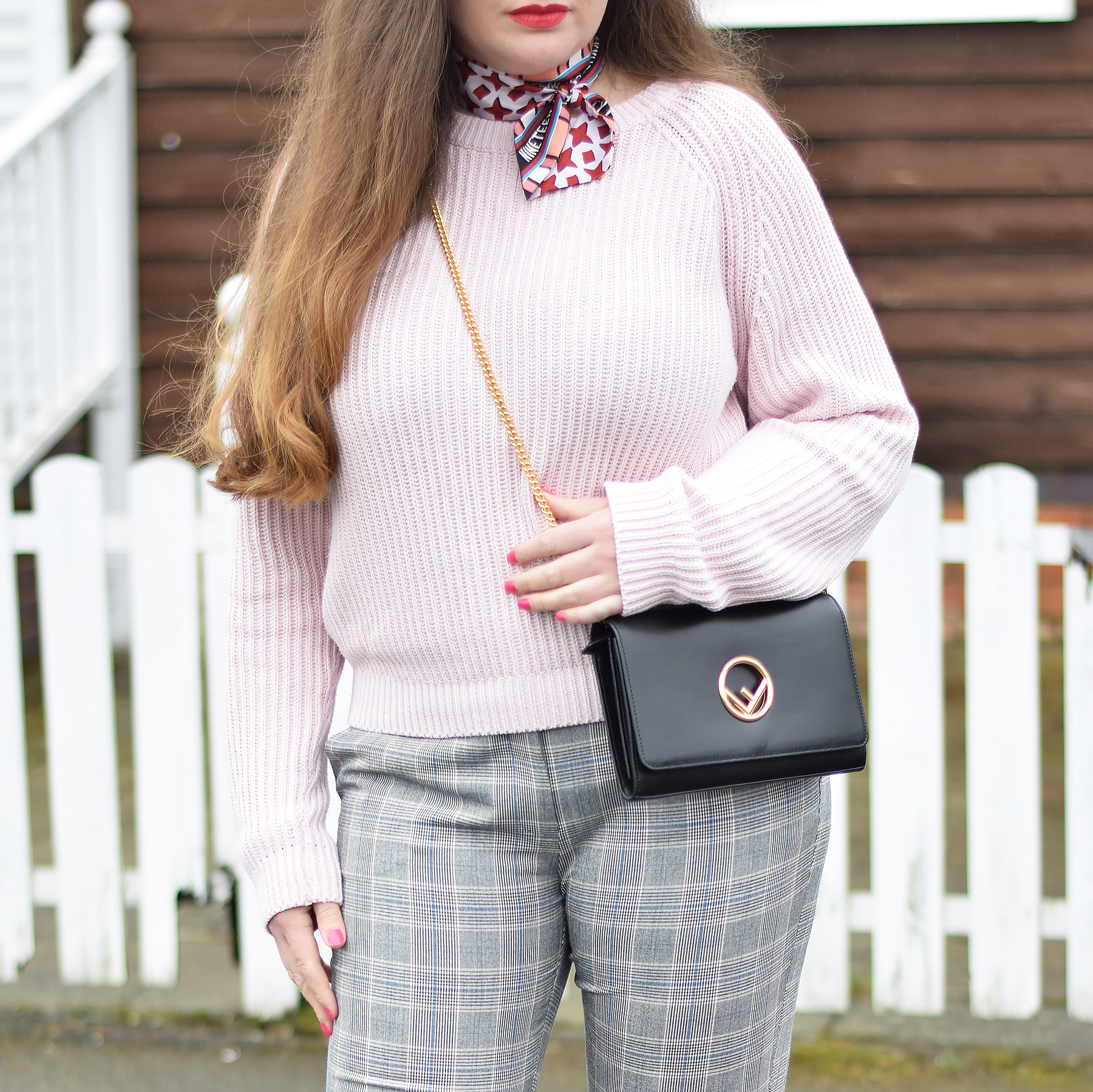 Pink jumper with fend nag and wrap