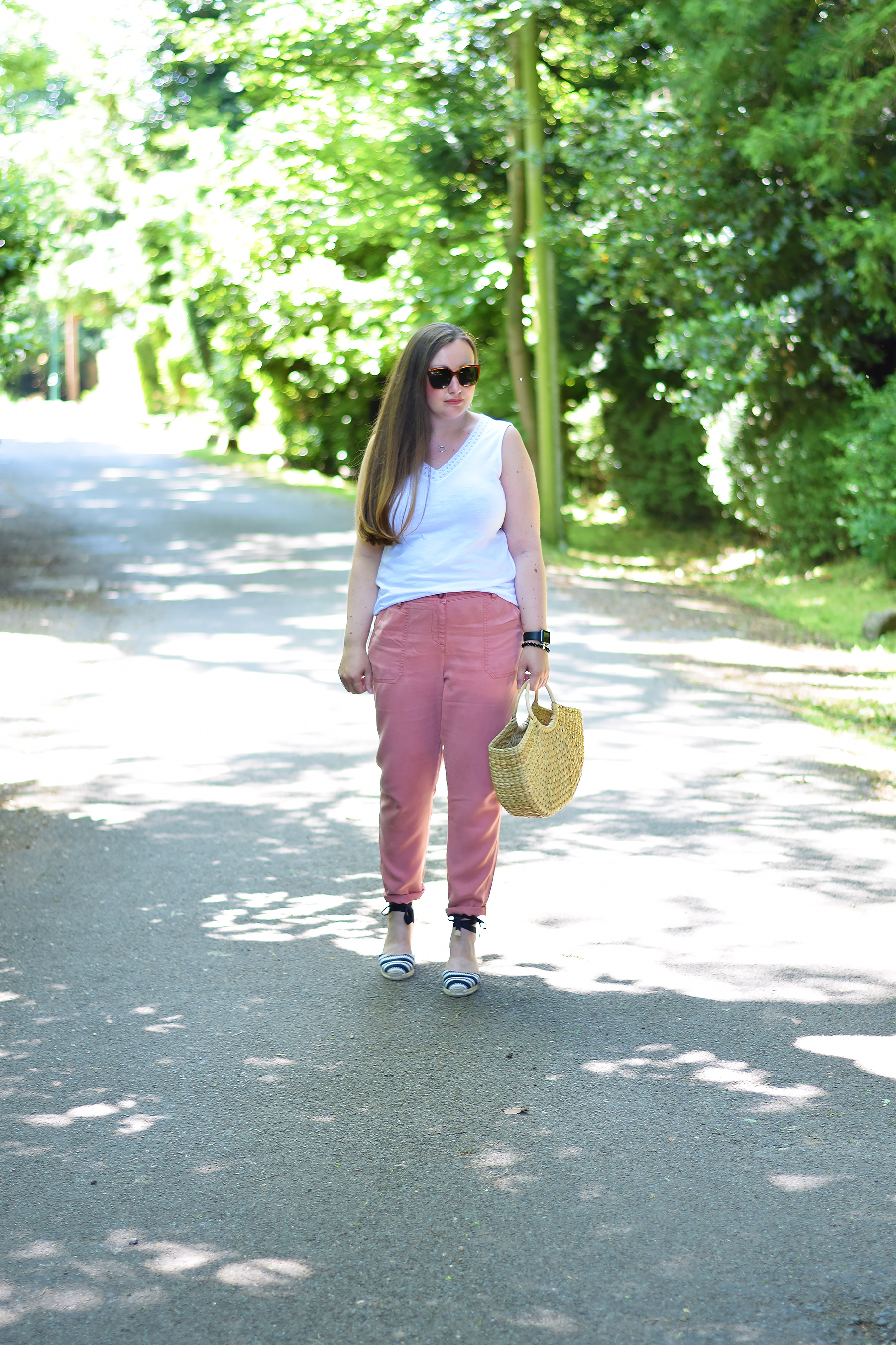 White pants and shop pink top
