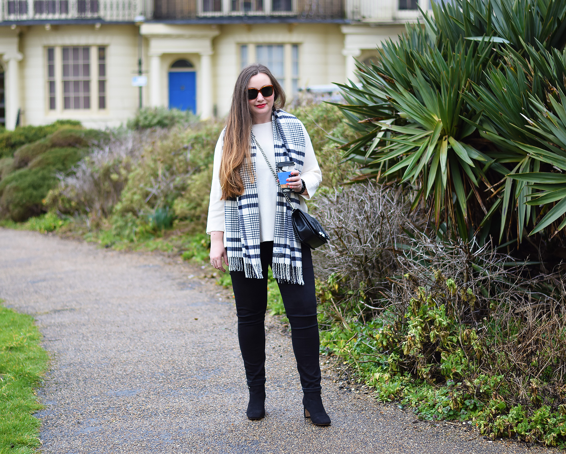 Layering a checked Scarf over a jumper AW18