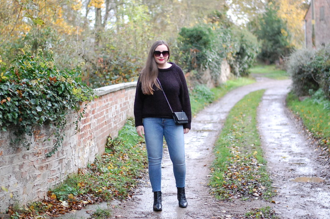 Black jumper and jeans store