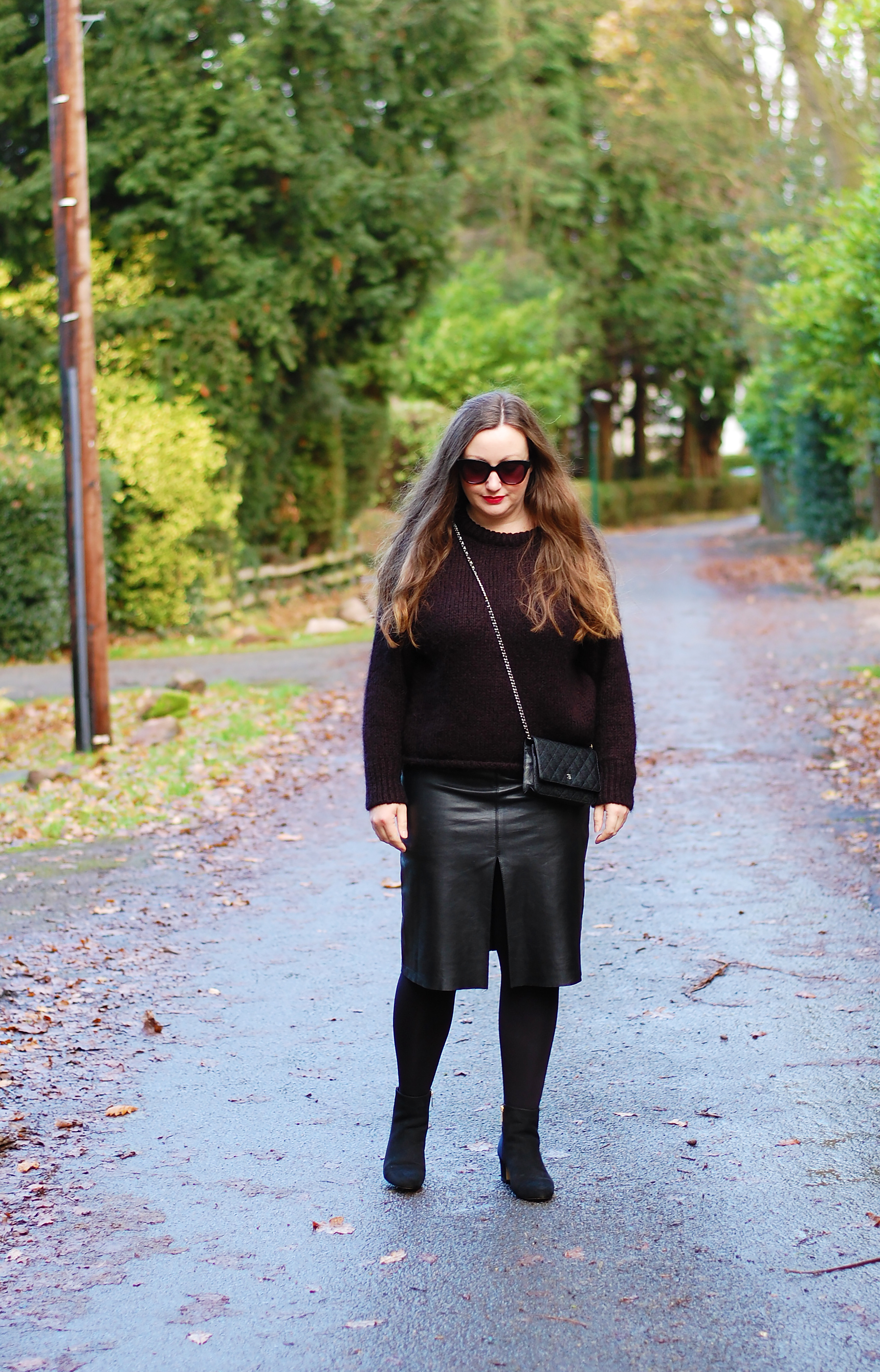 How to Style A Black Leather Midi Skirt