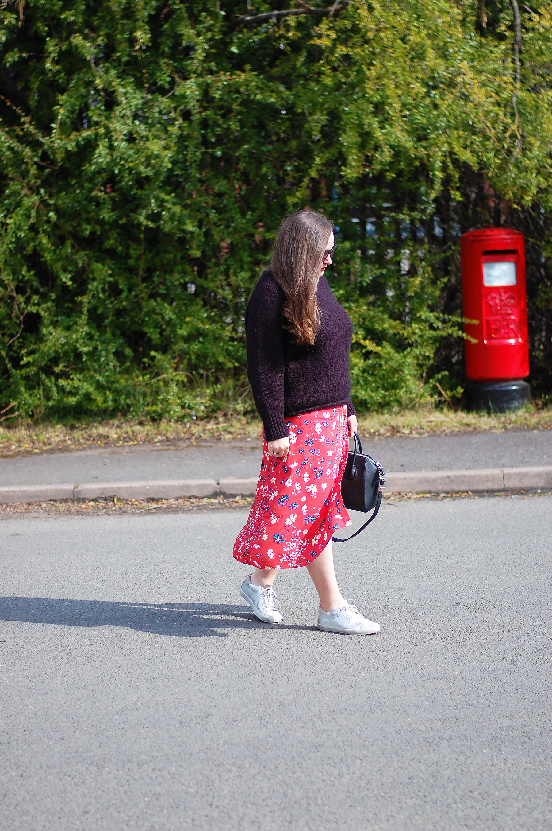 How to style a red floral midi skirt with sneakers