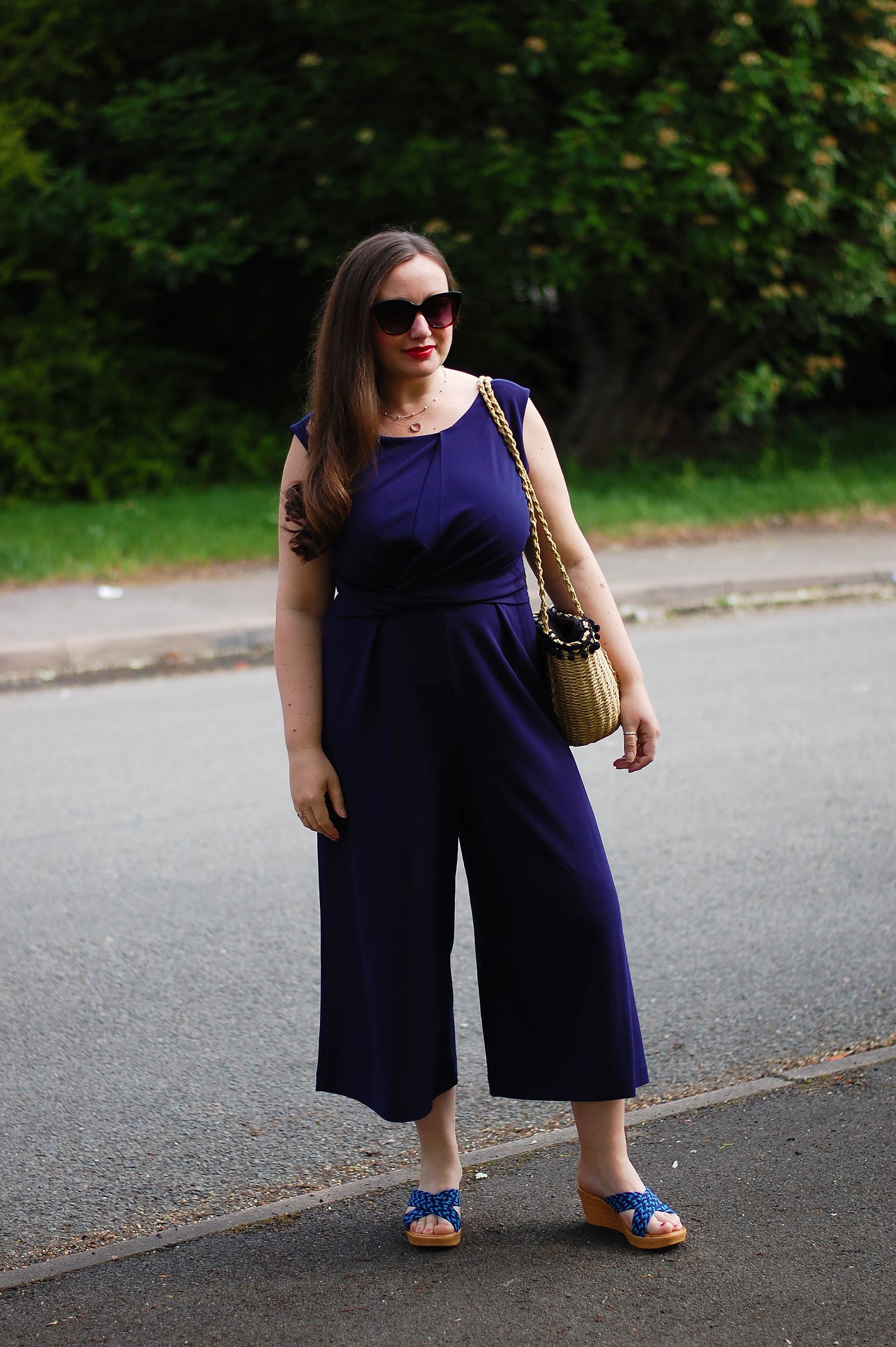 Jumpsuit, wedges and basket bag outfit