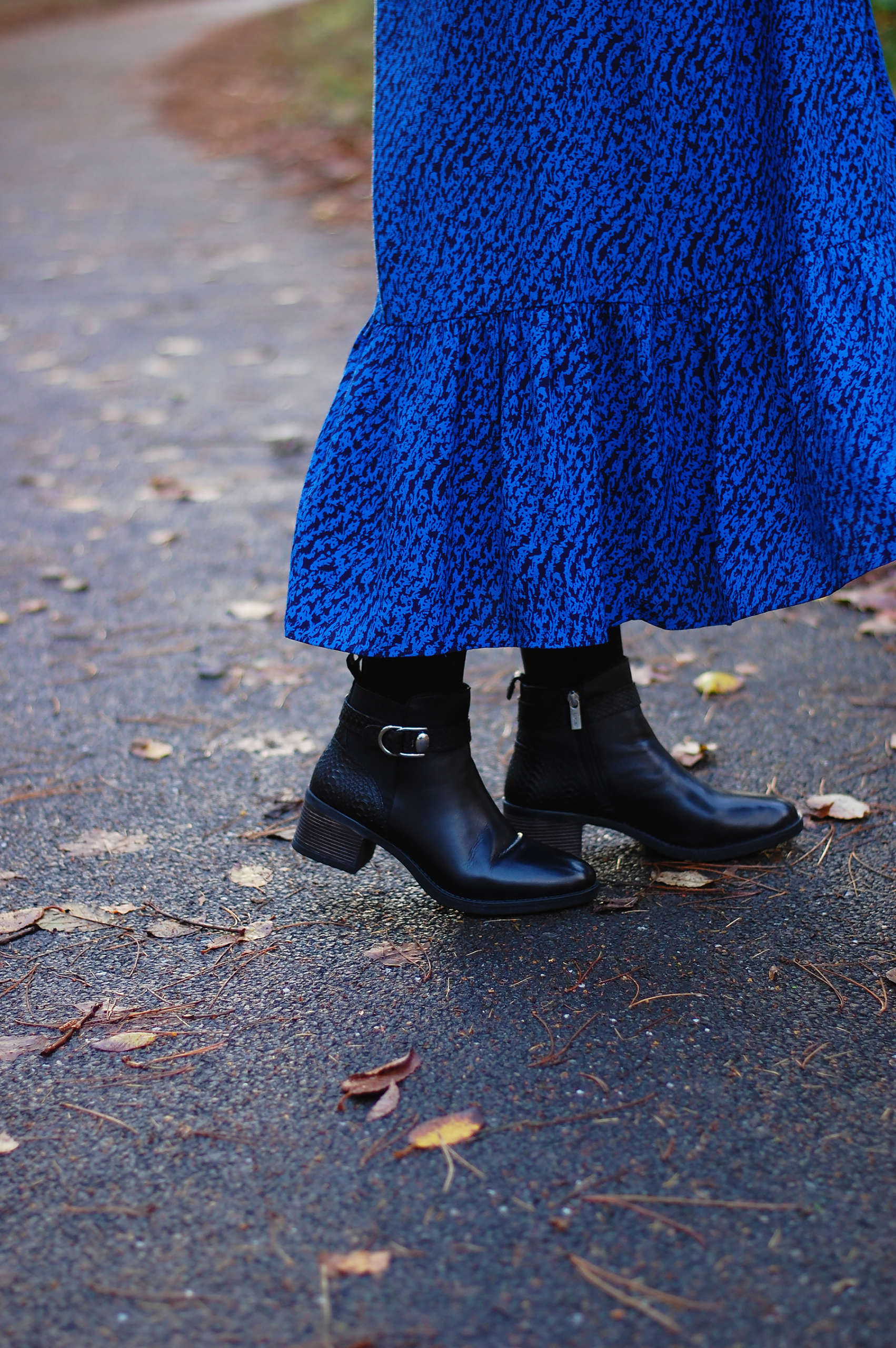 Black ankle boots and a long dress outfit