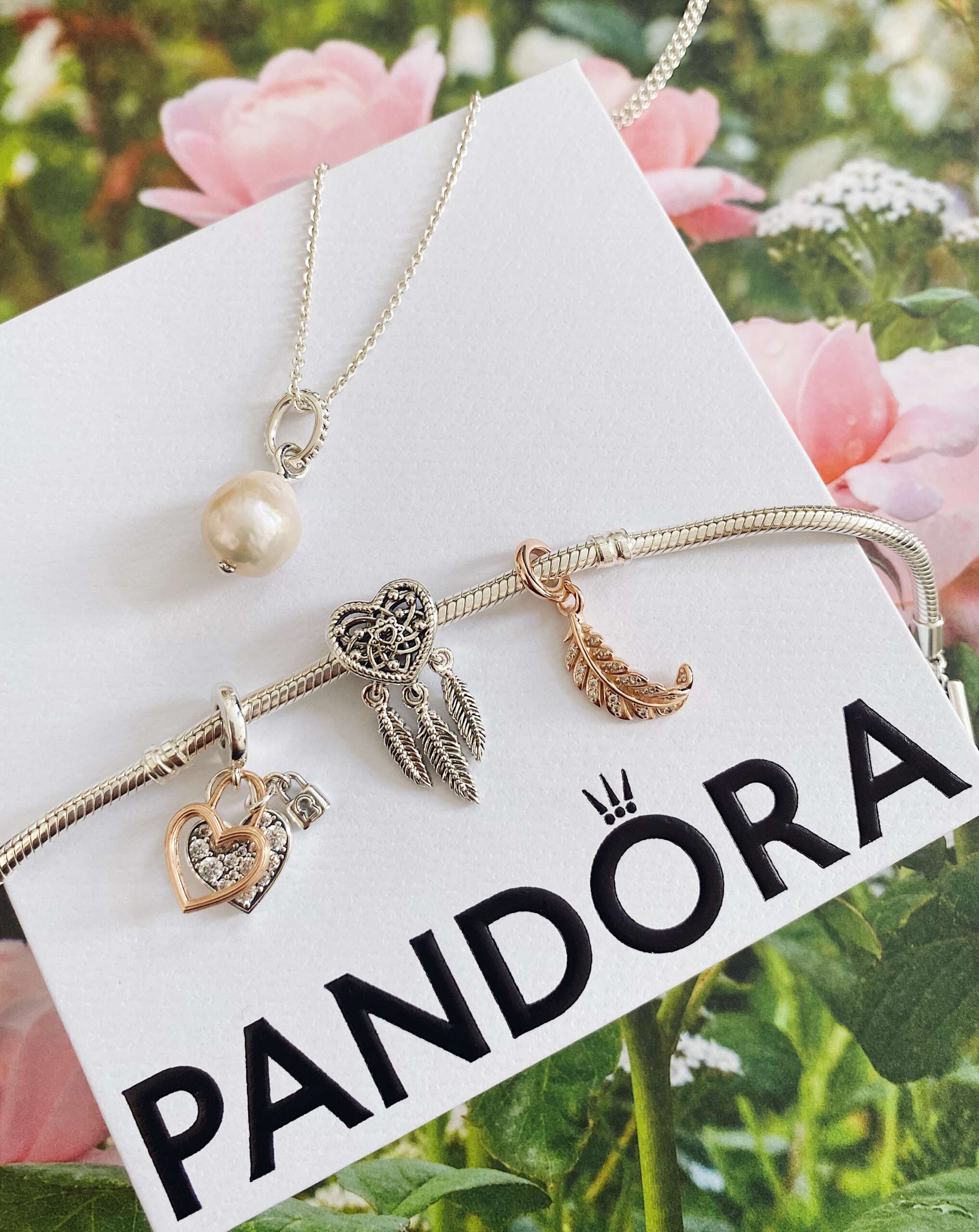 Pandora Charm Bracelet and Pearl Pendant