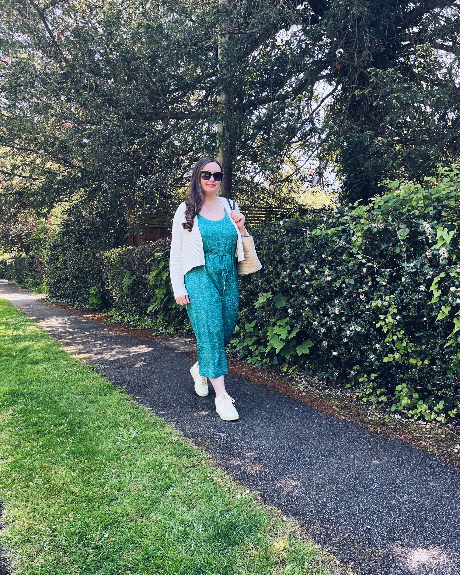 Aqua Colour Jumpsuit with Cream Cardigan and Trainers