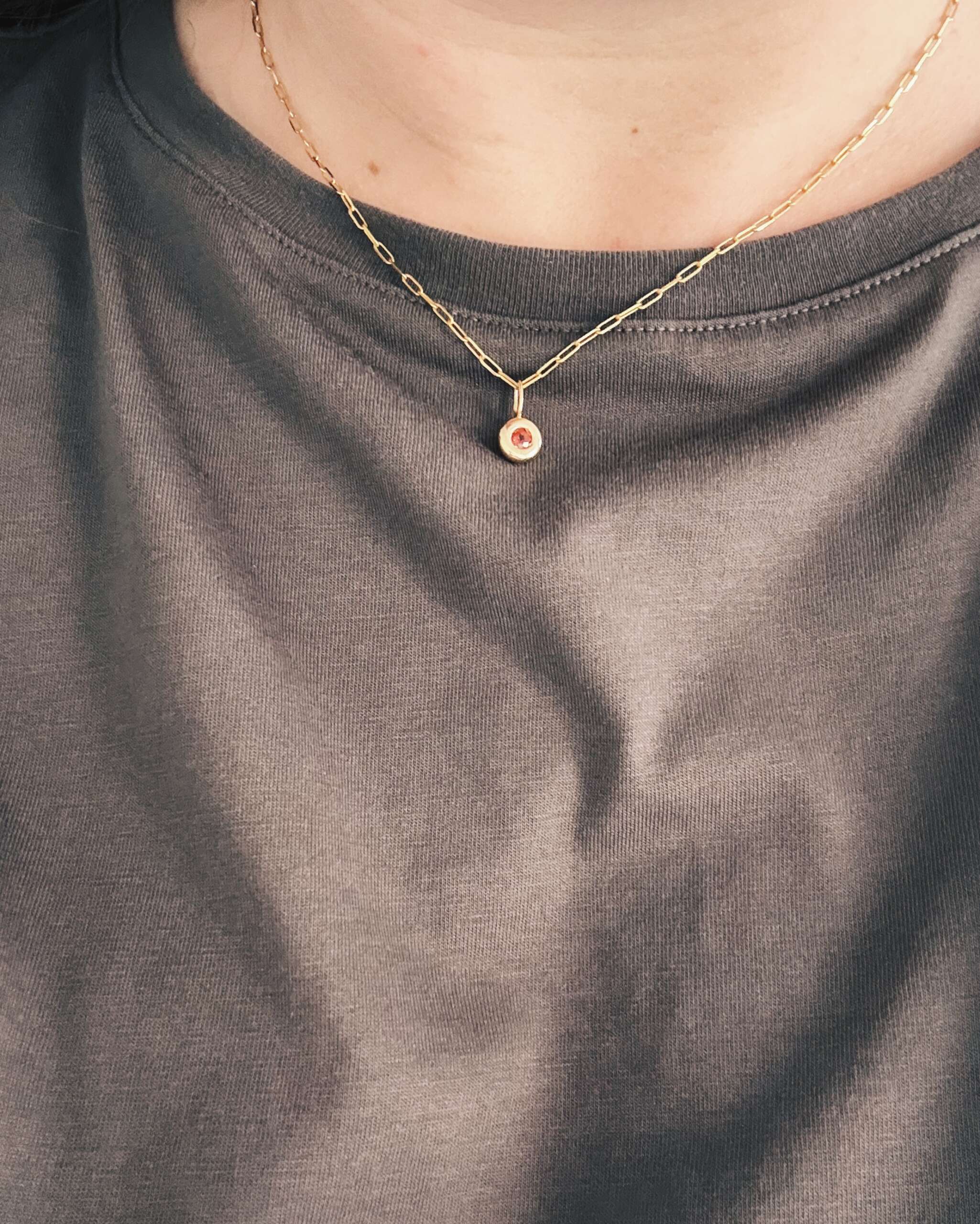 Evelyn Gold Signature Birthstone Pendant on a short length solid gold chain